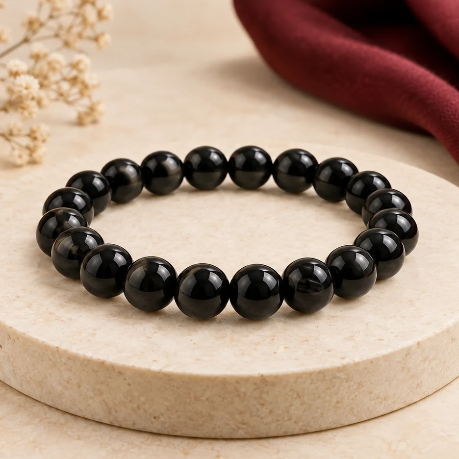 Black Obsidian Bracelet — Polished Glassy Beads — closer product detail; original illustrative product photography