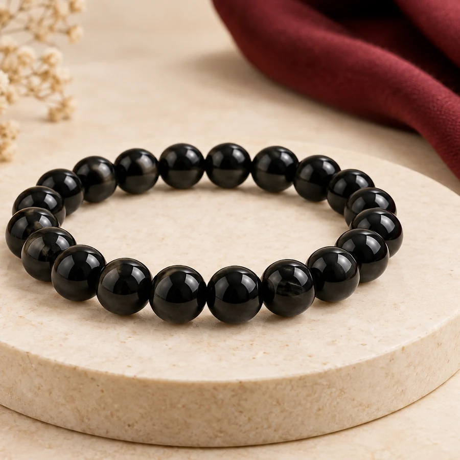 Black Obsidian Bracelet — Polished Glassy Beads — right-framed detail; original illustrative product photography